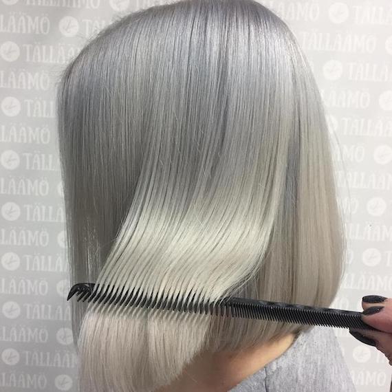 Woman with classic, blonde bob, created using Wella Professionals