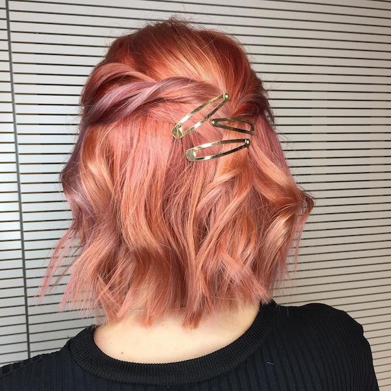 Woman with short, peachy bob, created using Wella Professionals
