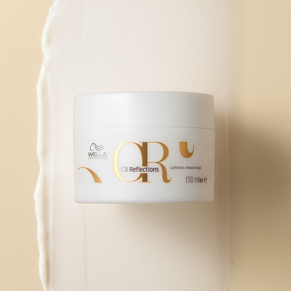 Oil Reflections Luminous Reboost Mask on a gold background.