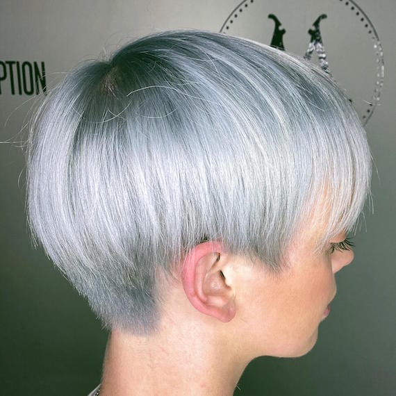 Photo of woman with gray blonde pixie cut, created using Wella Professionals.