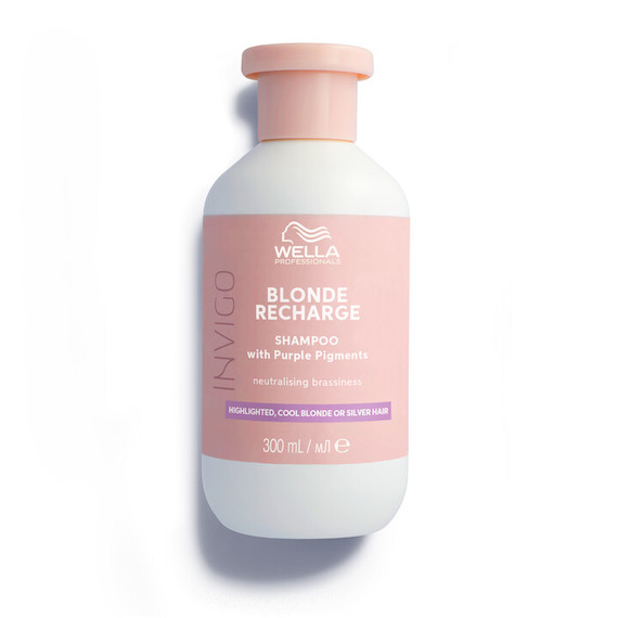 A bottle of INVIGO Blonde Recharge Cool Blonde Shampoo.