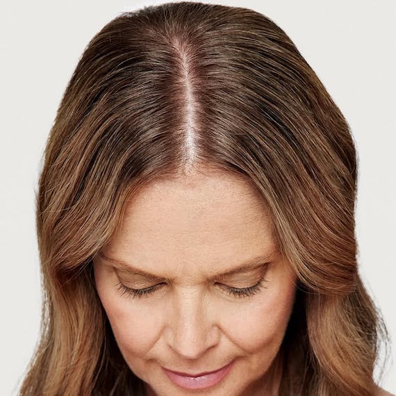 Model’s gray roots are covered by Koleston Xpress.