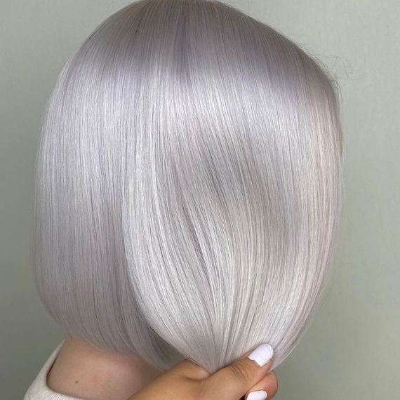 Back of head showing hair that’s been transformed into pure, lilac platinum
