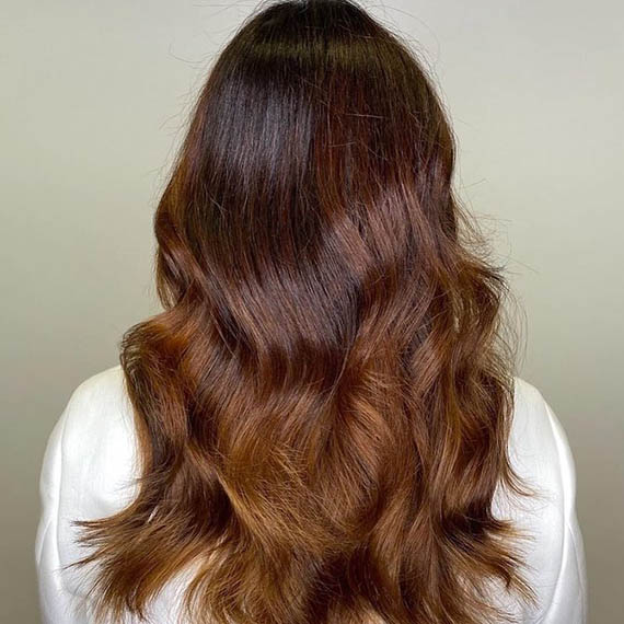 Model’s hair appears rich, glossy and free of grays after using Koleston Perfect.