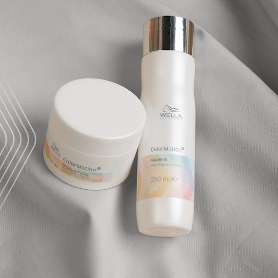 A jar of Wella’s ColorMotion+ Structure+ Mask and a bottle of ColorMotion+ Color Protection Shampoo.