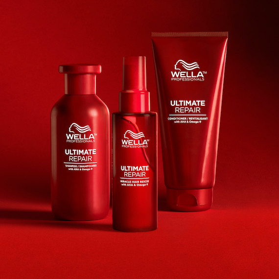 ULTIMATE REPAIR Shampoo, Conditioner and Miracle Hair Rescue appear side by side against a red backdrop.