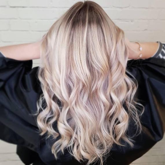 Balayage on light blonde hair, created using Wella Professionals