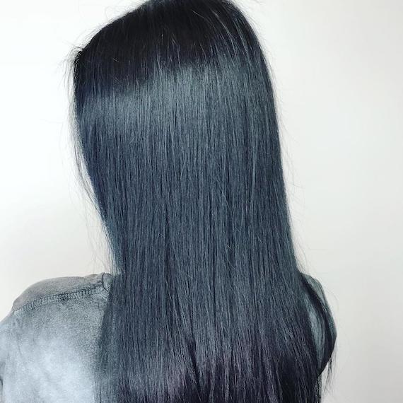 ck-of-the-head photo of straight, jet blue hair, created using Wella Professionals
