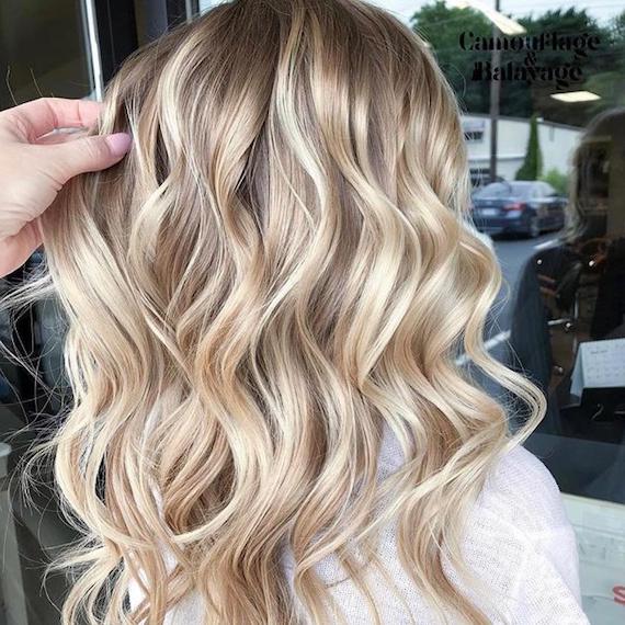 Image of woman with toasted coconut hair created using Wella Professionals products