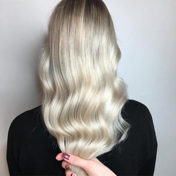 Image of woman with toasted coconut hair created using Wella Professionals products