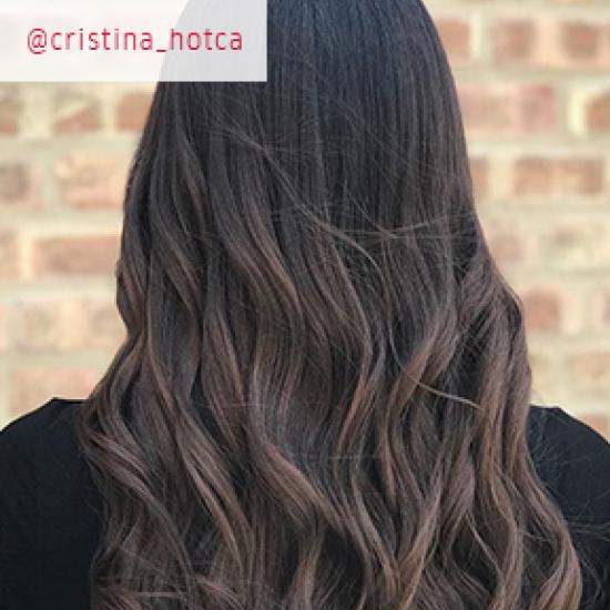 Back of woman’s head with long,dark ash brown hair