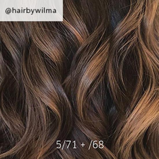 Nahaufnahme von dunkelbraunem Balayage-Haar, kreiert mit Wella Professionals.