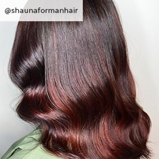 Back of womans head showing chili chocolate hair