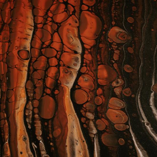 brown ink swirled in water