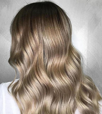 Glossy baby highlights, created using Wella Professionals