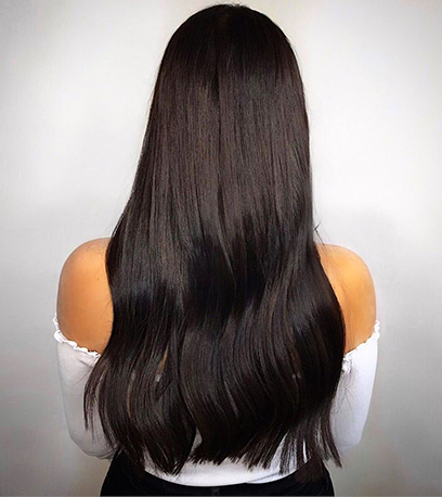 Dark cherry cola hair, created using Wella Professionals products