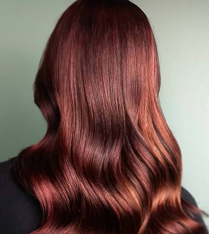 Luminous chili chocolate hair, created using Wella Professionals