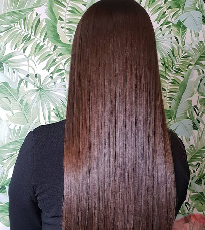 Luscious chili chocolate hair, created using Wella Professionals