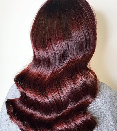 Warm chili chocolate hair, created using Wella Professionals