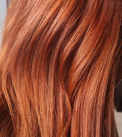 Image of wavey Muted Auburn, created using Wella Professionals