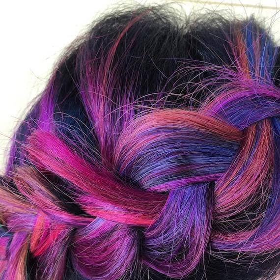 A close up of a braid of purple and pink hair created with Color Fresh Create