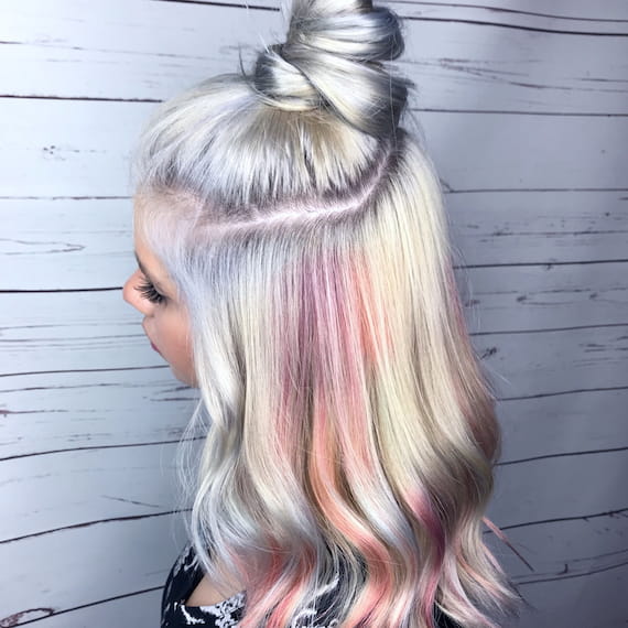 A close up of a braid of purple and pink hair created with Color Fresh Create
