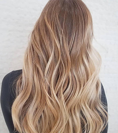 Buttery blonde hair, created using Wella Professionals