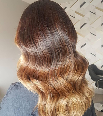 Toffee balayage hair, created using Wella Professionals